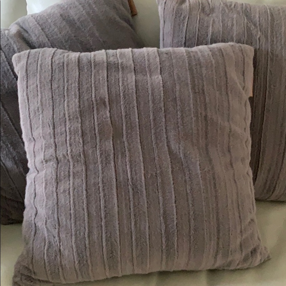 Three Koolaburra by UGG throw pillows.